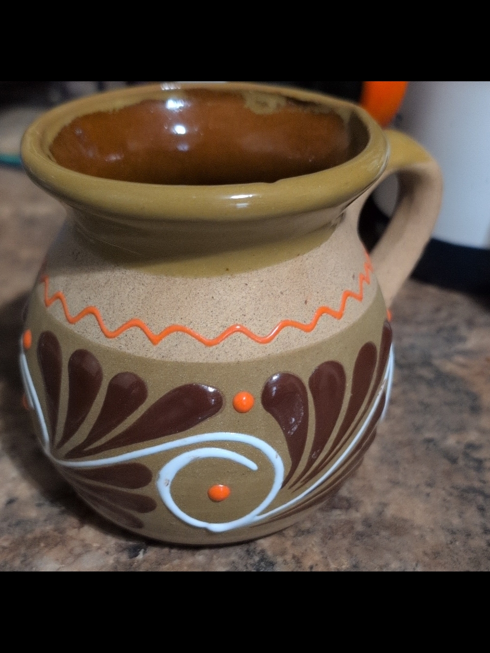 Hand-Painted Brown Ceramic Coffee Mug with Orange and White Accents